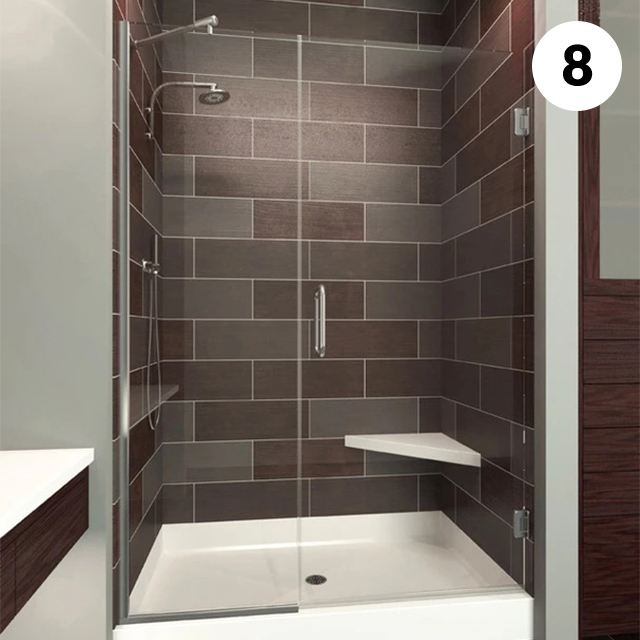 Frameless glass shower enclosure